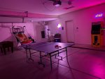 Game/rec room in the garage Includes ping-pong, foosball, arcade basketball, arcade game with 14 different games, bean bags corn hole, and bocce ball